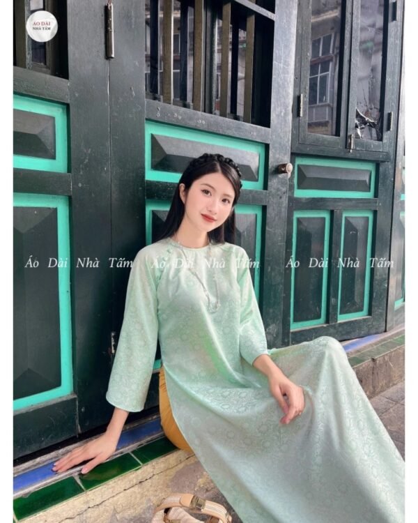 Cho Thuê Áo Dài Cổ Tròn Hoa Chìm Xanh Ngọc