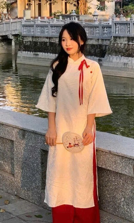 Cho Thuê Áo Dài An Xing Nơ Hồng Đậm Kem