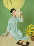 Cho Thuê Áo Dài Cổ Trụ Hoa Chìm Xanh Ngọc