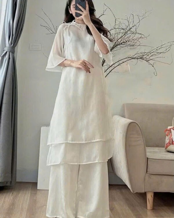 Cho Thuê Áo Dài Cổ Tròn An Xing Voan Trơn Kem